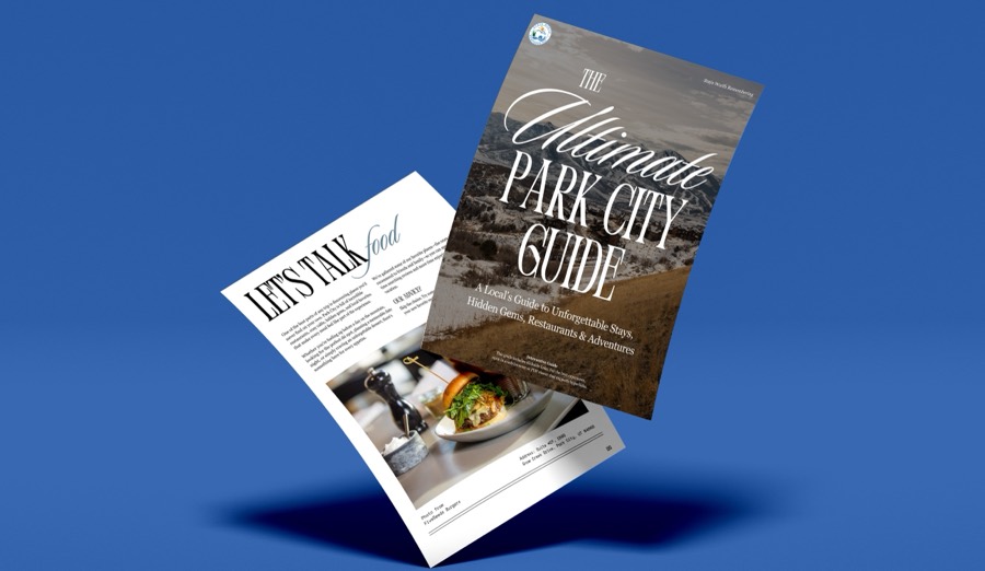 The Ultimate Park City Guide, shown with a page from inside the guide